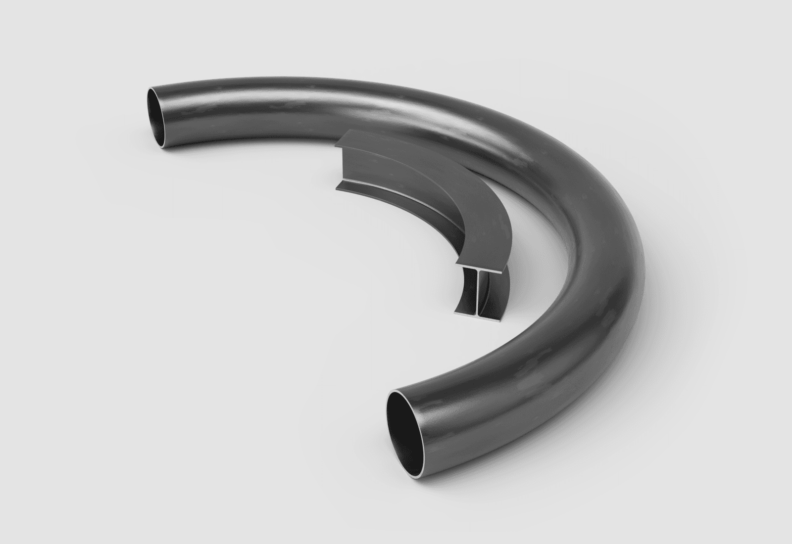 Large-diameter steel pipe rolled into a half circle, with a W-Beam rolled into a quarter circle inside it